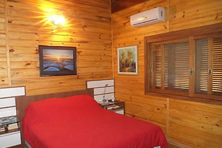 Foto do quarto da Casa em Condomínio em Gramado